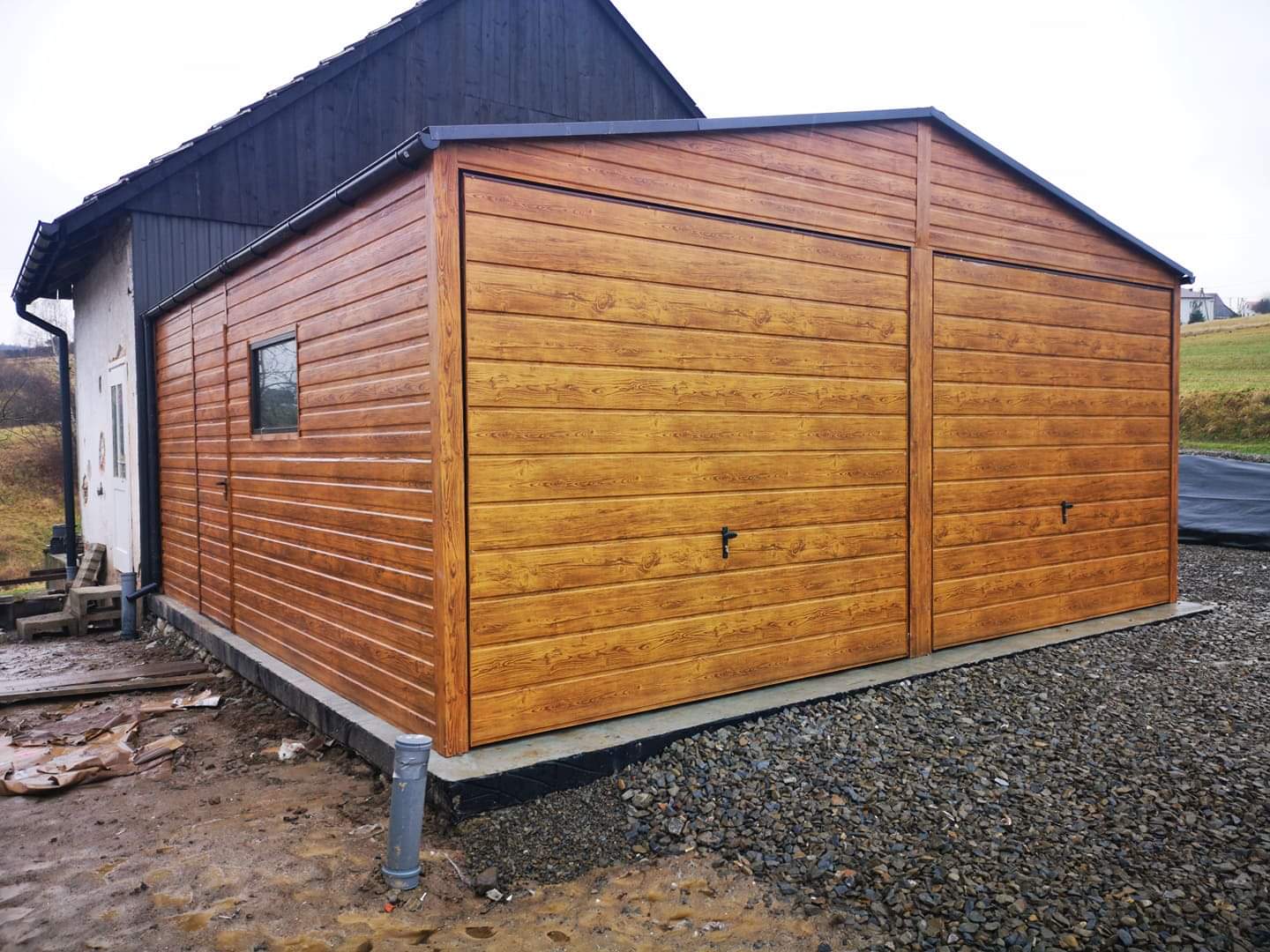 ZMK.Plechová garáž 6 x 6 m MULTIGROS ,sedlová střecha,výklopná vrata