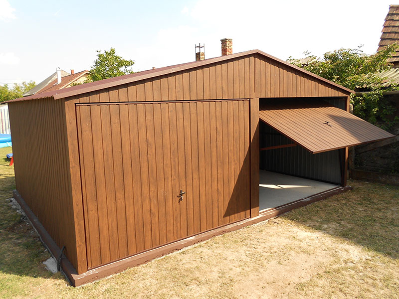 ZMK.Plechová garáž 6 x 5 m zl.dub,sedlová střecha,výklopná vrata