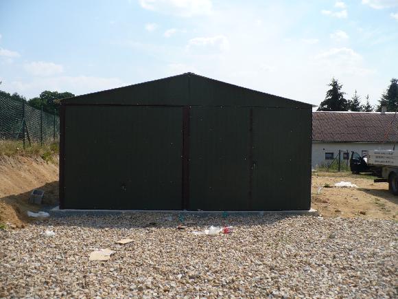 ZMK.Hospodářská plechová montovaná garáž 6 x 18 m v barvě 