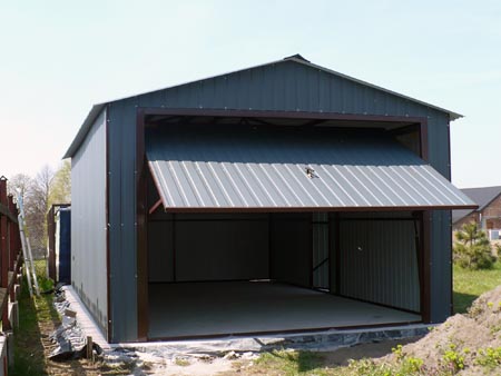 ZMK.Plechová garáž 3 x 5 m, sedlová střecha,výklopná vrata,boční dveře,barva 